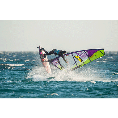 Model wearing 2020 O'Neill Mens Mutant Legend 5/4 Chest Zip Wetsuit with detachable hood windsurfing